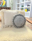 ROUND WITH POM POMS - MEDIUM