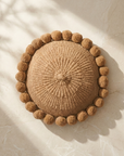 ROUND WITH POM POMS - MEDIUM