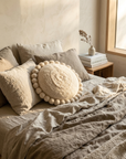 ROUND WITH POM POMS - MEDIUM